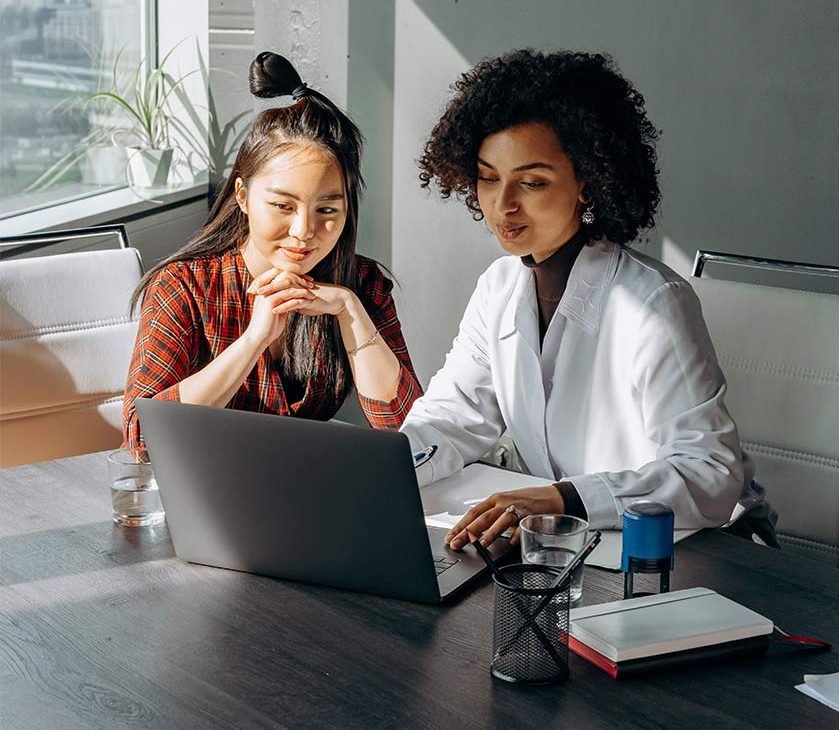 women looking at laptop
